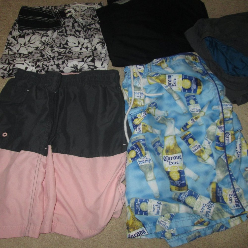 All four Swim Trunks, Men's two are XXL. One is 40/42, one is 38